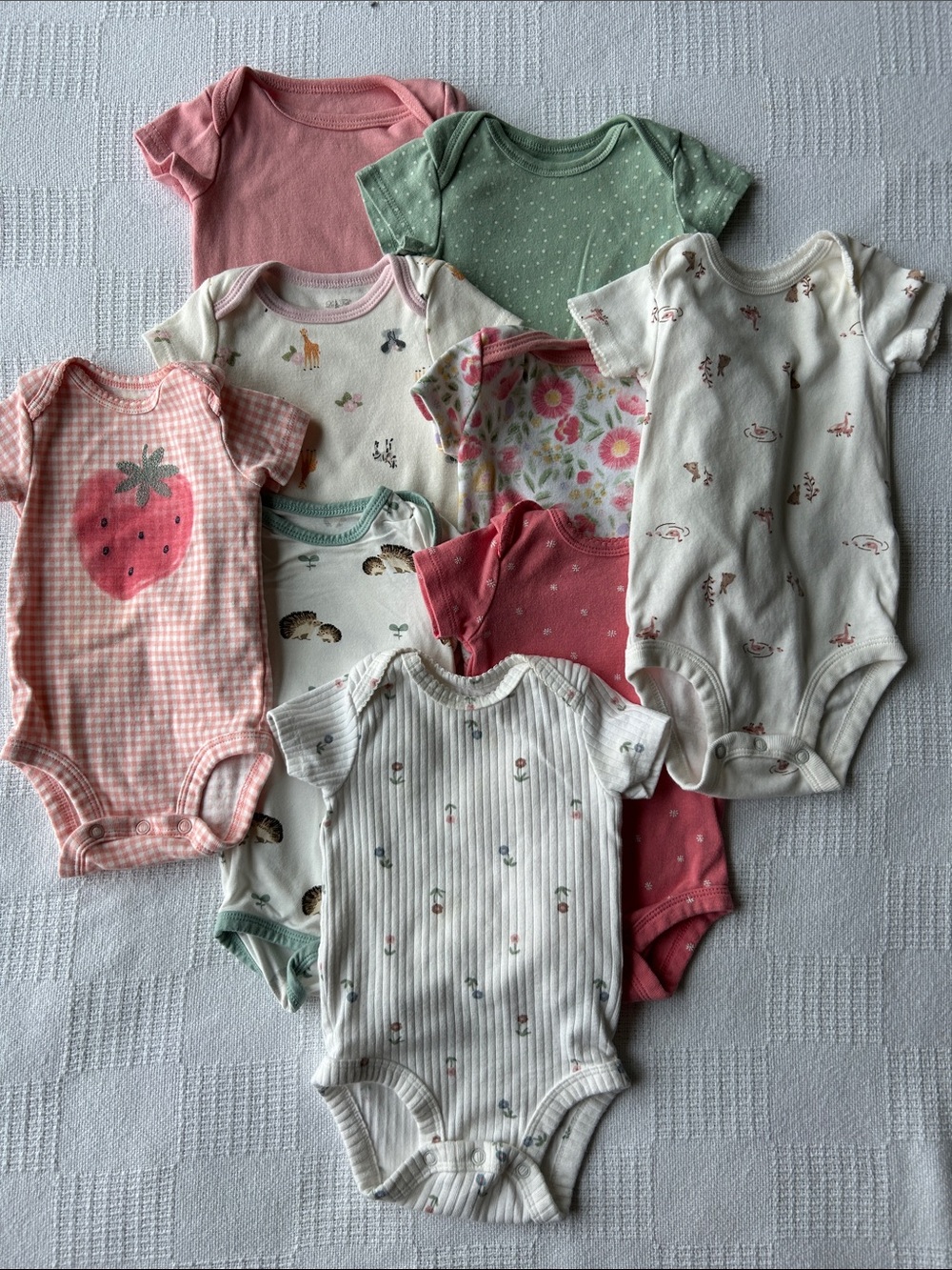 9 Girls Onesies size 0-3 months